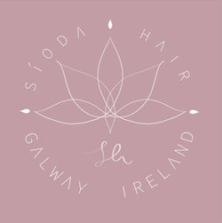 Síoda Hair logo, text Síoda Hair Galway Ireland with lotus flower in centre with initial S H below. Mauve background text and emblem in white