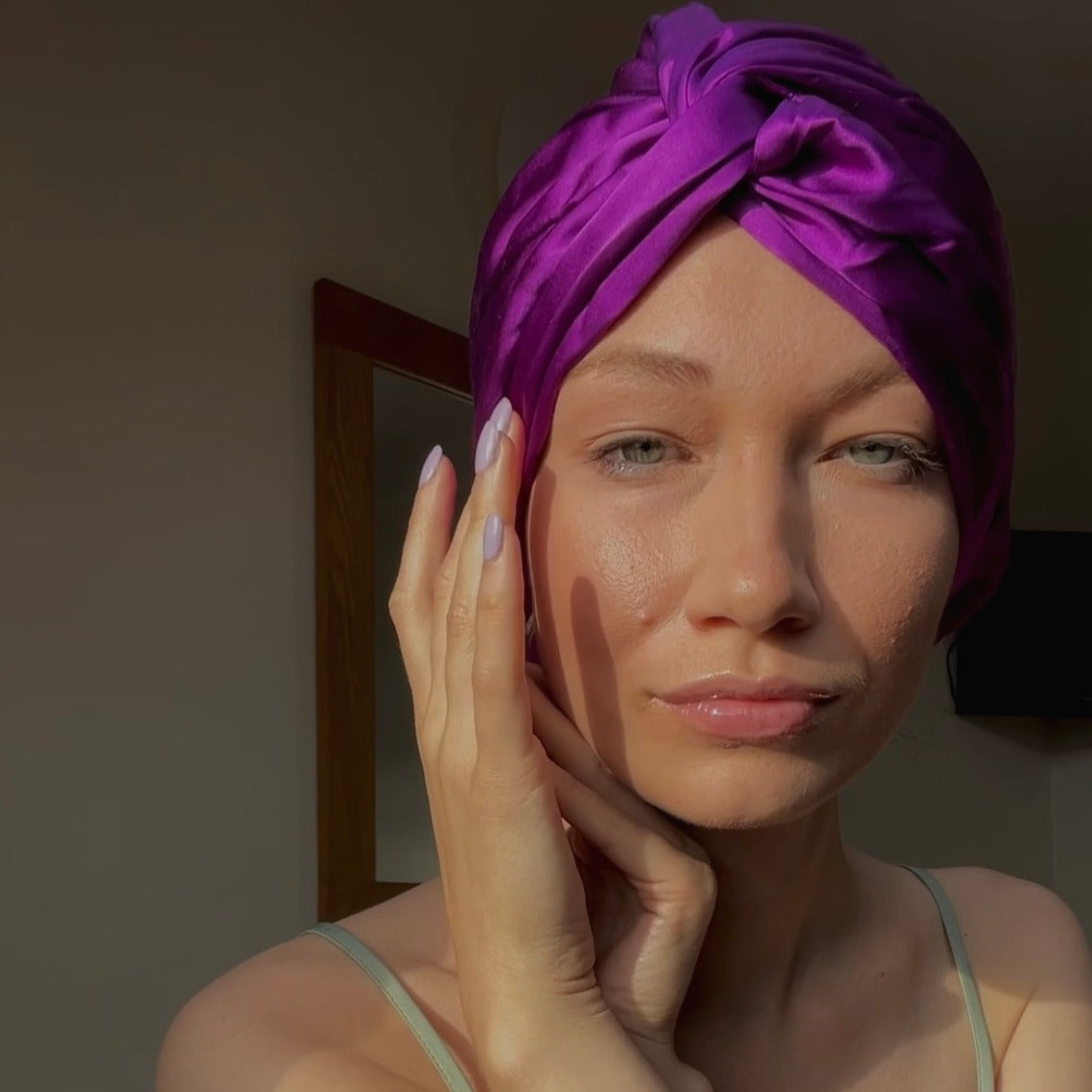 Deep purple mulberry silk hair wrap/turban/bonnet worn by a strikingly beautiful woman variant is named Apatura