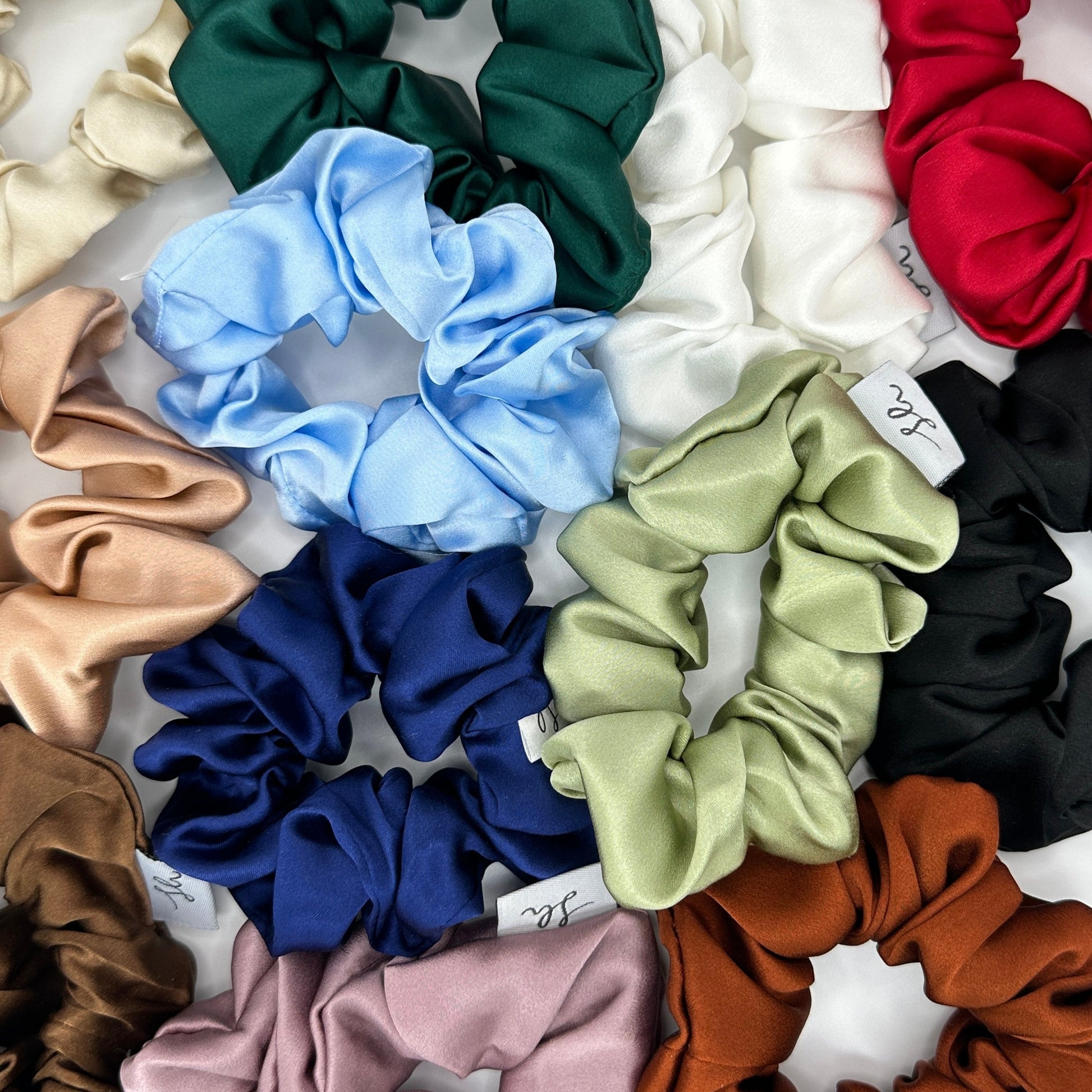 Síoda Silky 100% Mulberry Silk scrunchie size medium showing the full range of colours available