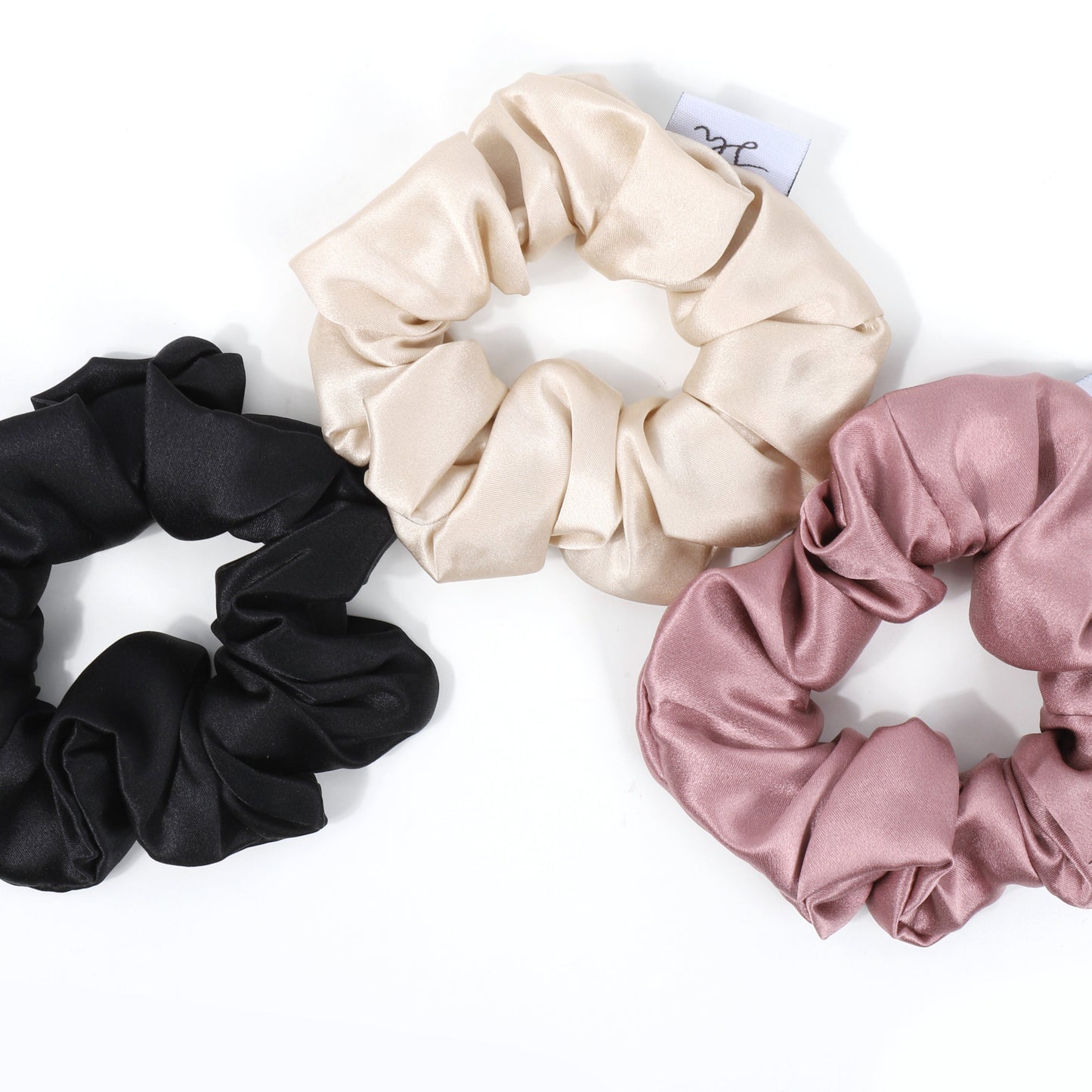 Síoda Silky 100% Mulberry Silk scrunchies size medium colours grouped together are Prosecco Gold, Blush pink, Midnight Black